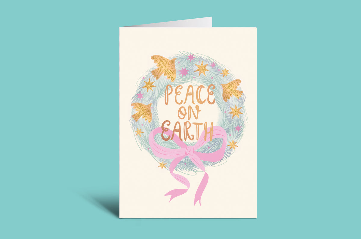 Greeting card with 'Peace on Earth' text and decorative elements on a light green background