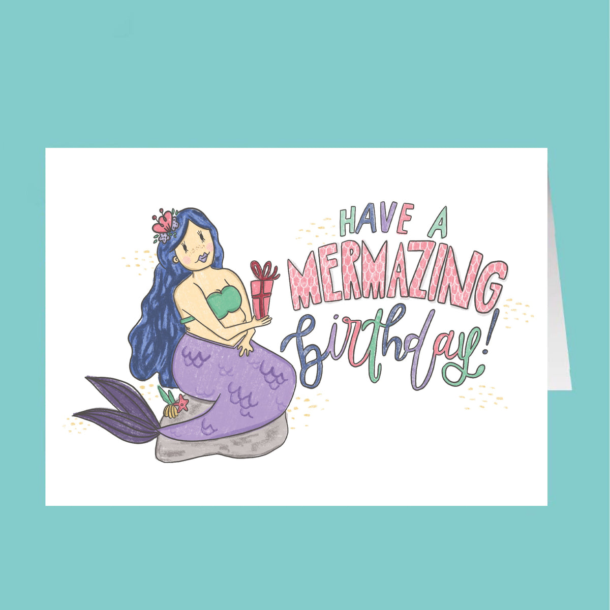 Birthday card with a mermaid and 'Have a Mermazing Birthday!' text on a teal background