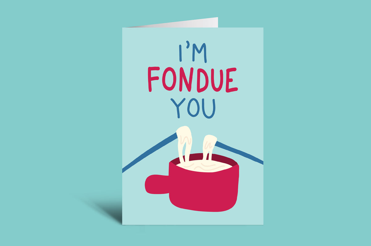 Greeting card with 'I'm Fondue You' text on a teal background