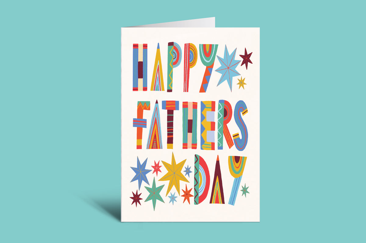 Colorful 'Happy Father's Day' card on a green background