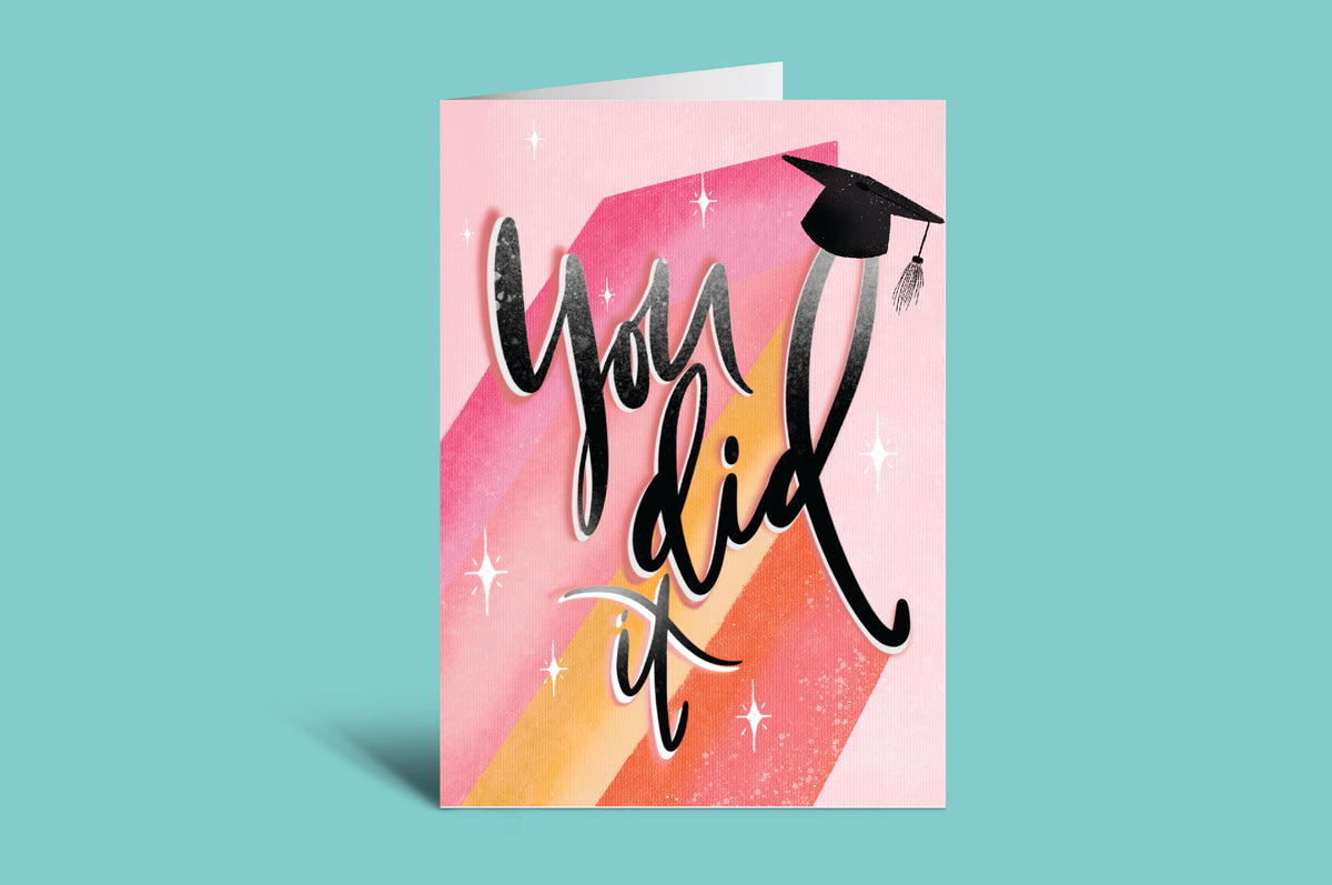 Greeting card with 'You did it!' text on a colorful background
