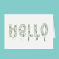 Text 'HELLO THERE' with floral patterns on a teal background