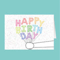 Greeting card with 'Happy Birthday' text in colorful balloon letters on a white background.