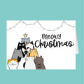 Card with cartoon cats and 'Meowy Christmas' text on a teal background