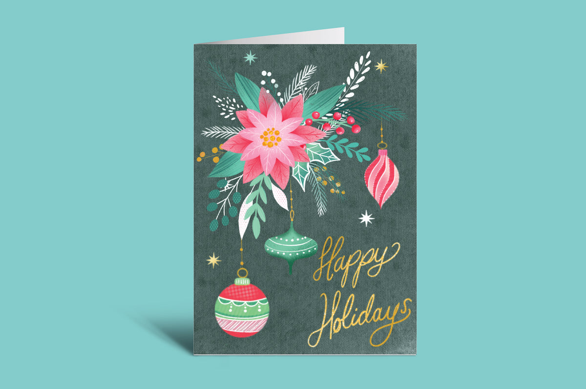 Greeting card with floral design and 'Happy Holidays' text on a green background