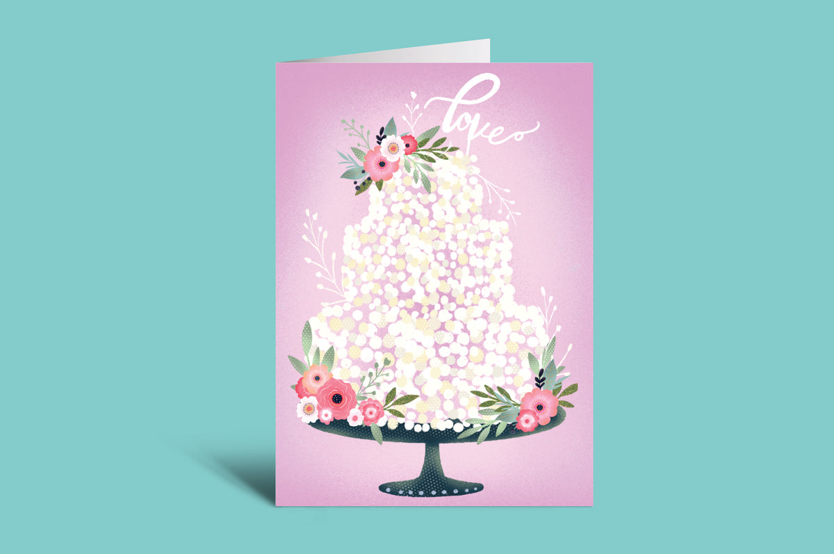 Greeting card with floral design and 'Love' text on a pink background