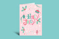 Pink Christmas card with 'Holly Jolly Christmas' text on a green background