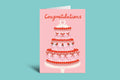 Pink congratulation card with a cake illustration on a teal background