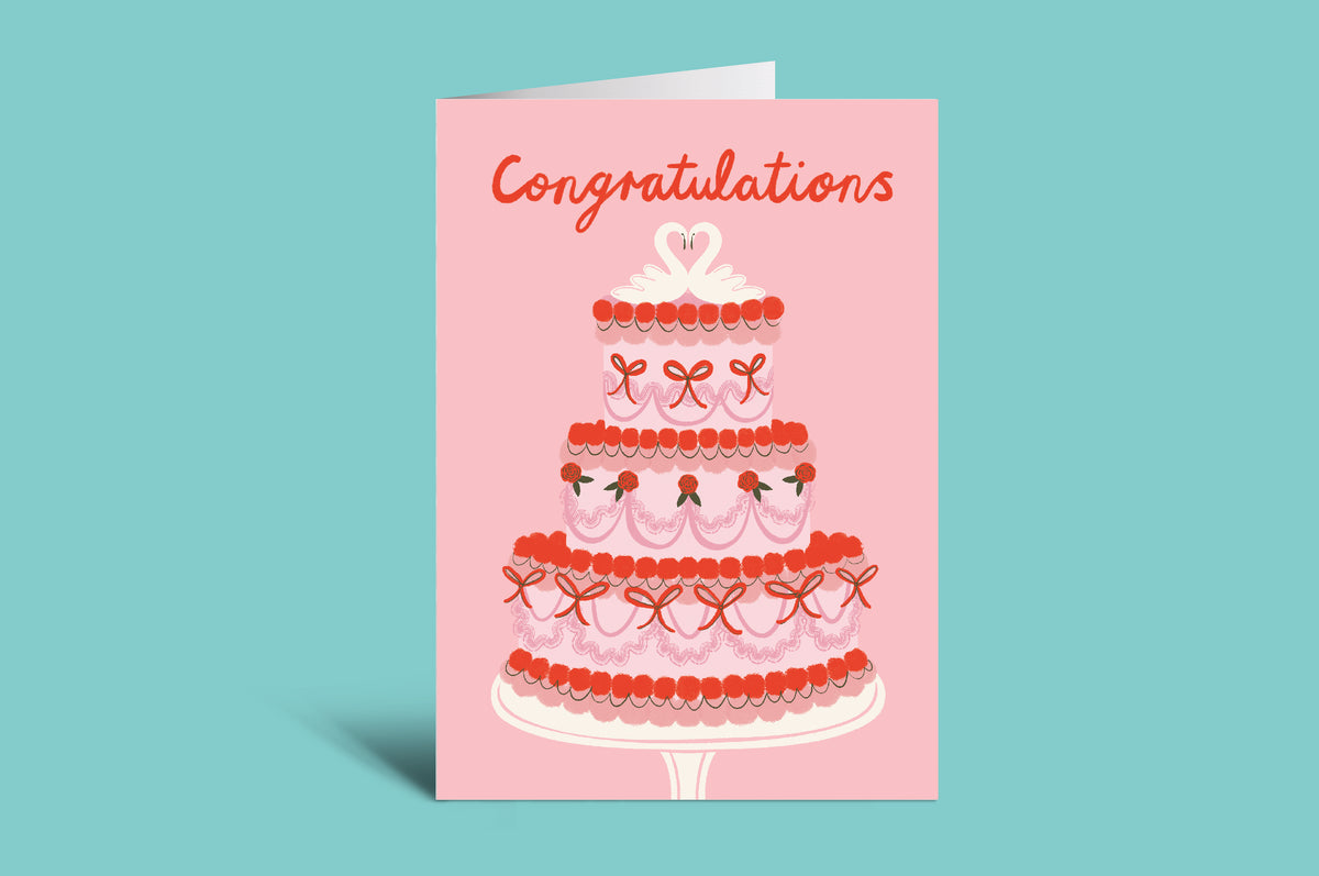 Pink congratulation card with a cake illustration on a teal background