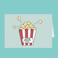 Cartoon popcorn bucket with 'You're the greatest pop!' text on a light blue background