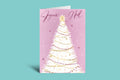 Christmas card with a white tree and 'Joyeux Noel' text on a purple background