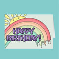 Birthday card with rainbow and sun illustration on a teal background