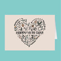 Card with floral heart design and 'Happy Mom Day!' text on a beige background