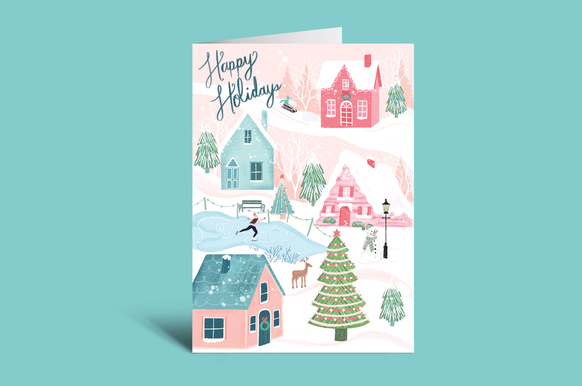 Holiday card with festive village design on a teal background