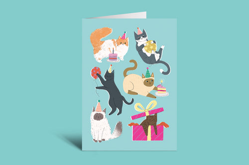 Greeting card with cartoon cats celebrating on a green background