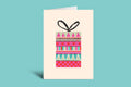 Greeting card with colorful pattern on a light green background