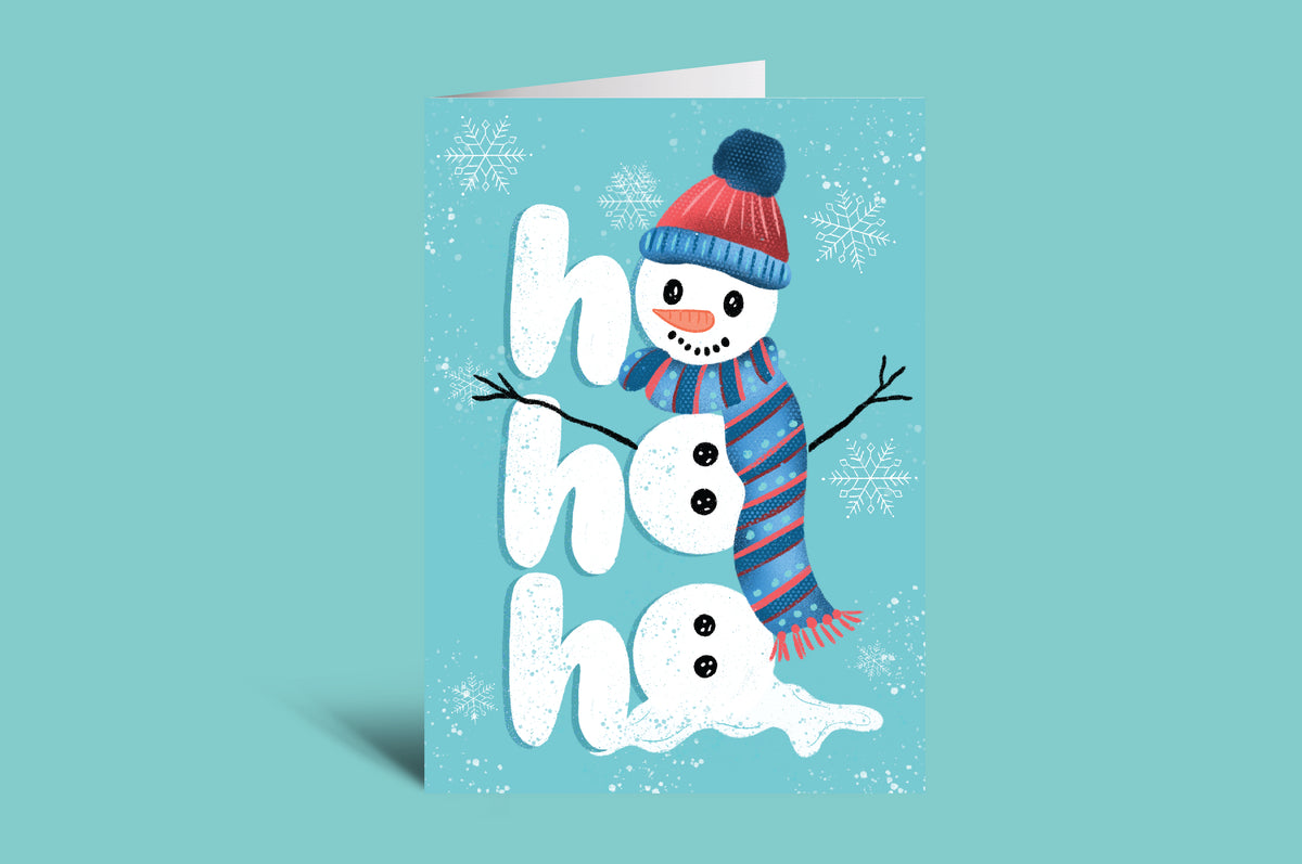 Greeting card with a snowman design on a teal background
