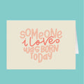 Card with 'Someone I love was born today' text on a light blue background