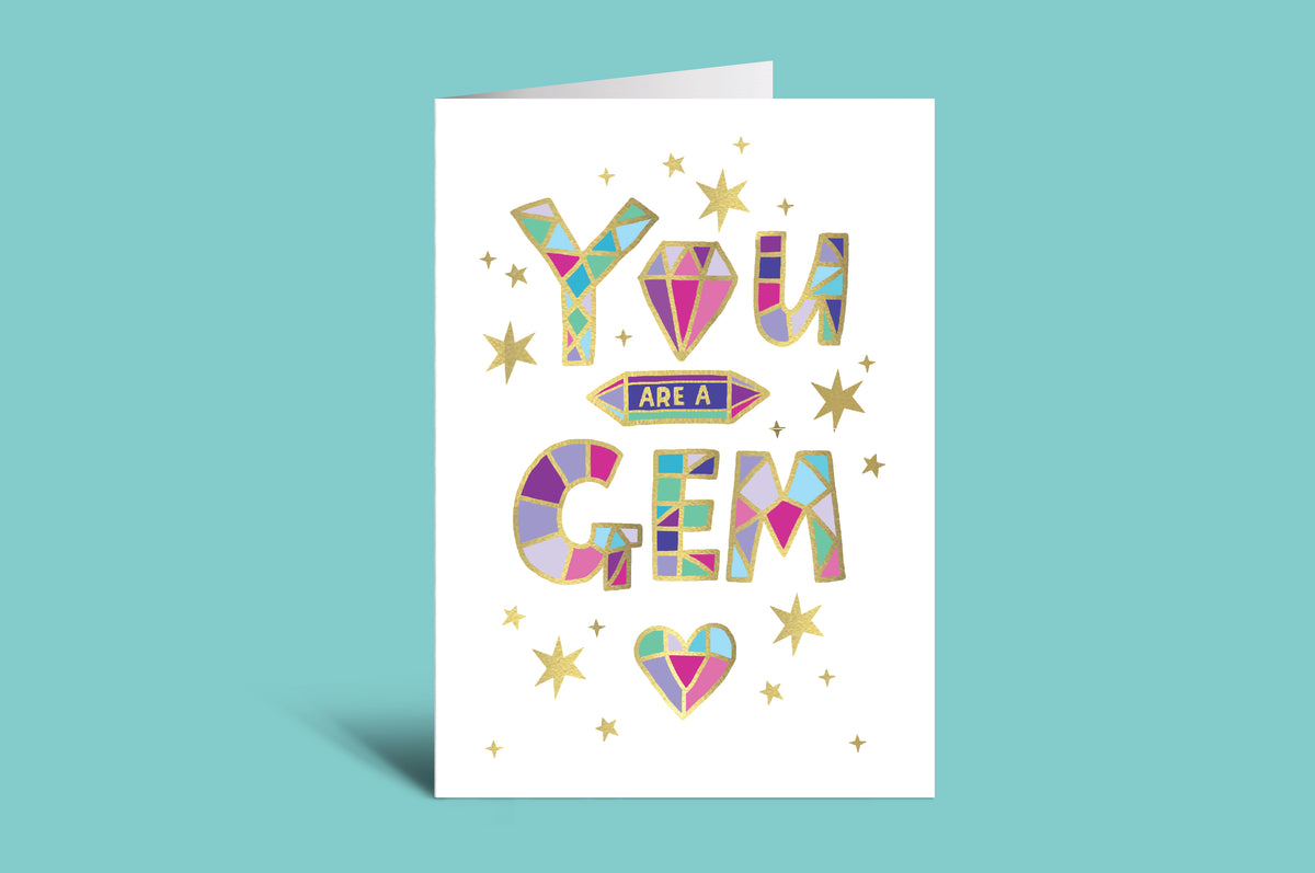 Greeting card with colorful gemstone design and text 'YOU ARE A GEM' on a green background