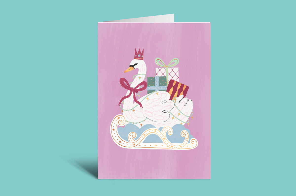 Greeting card with a swan holding presents on a purple background