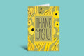 Greeting card with 'Thank You' text and floral design on a green background