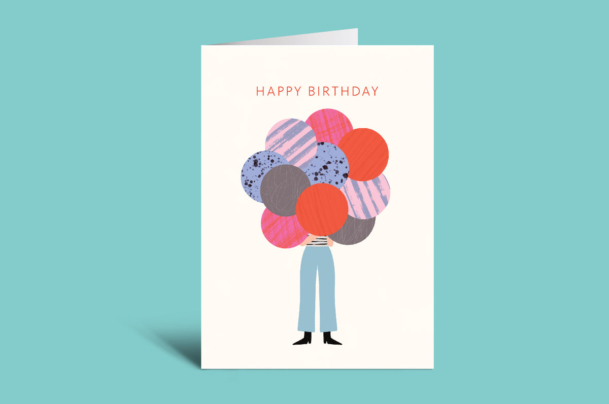 Birthday card with colorful balloons and 'Happy Birthday' text on a green background