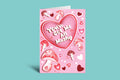 Pink greeting card with heart design and mushroom illustrations on a teal background