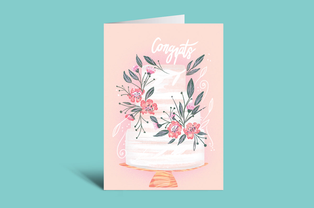 Greeting card with floral design and 'Congrats' text on a pink background