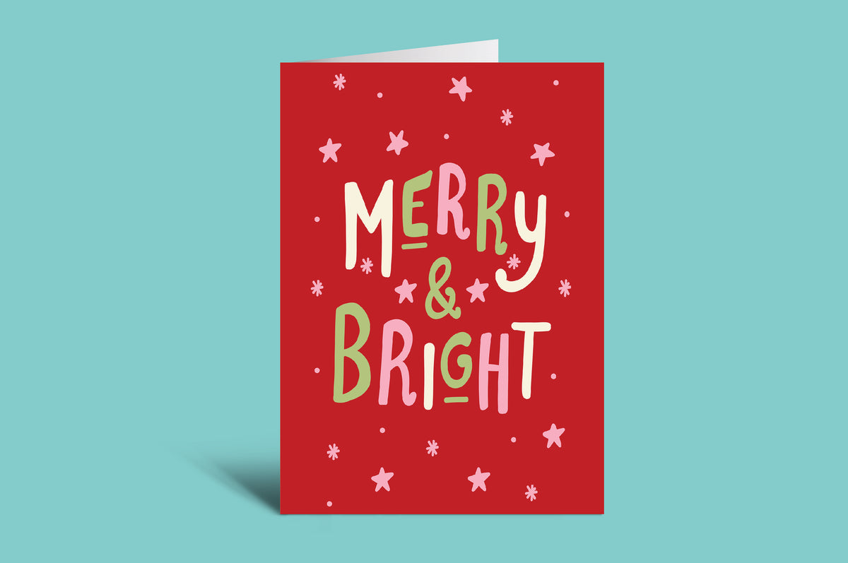 Red greeting card with 'Merry & Bright' text on a green background