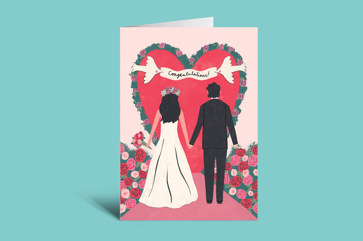 Wedding card with a couple under a heart-shaped arch on a pink background