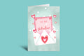 Valentine's Day card with hearts and 'Be my Valentine' text on a light green background