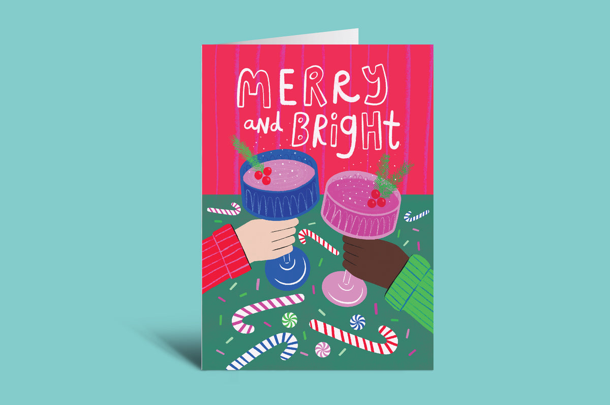 Greeting card with 'Merry and Bright' text and festive design on a green background