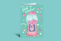 Valentine's Day card with a gumball machine and heart-themed design on a green background