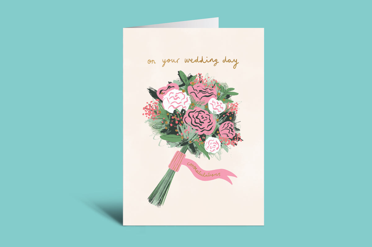 Wedding card with floral design and 'on your wedding day' text on a green background