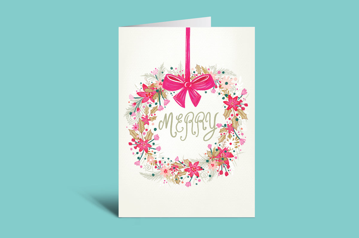 Greeting card with floral design and pink bow on a green background