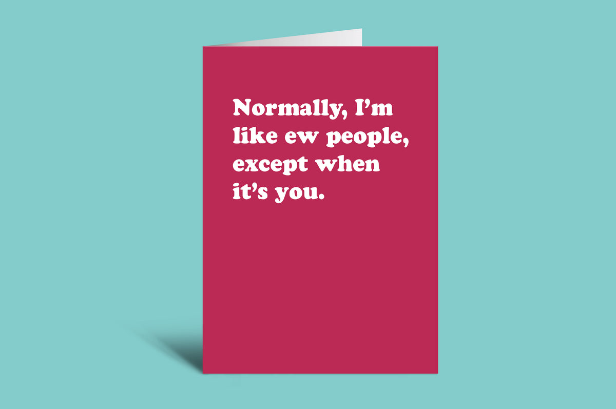 Pink card with humorous text on a teal background