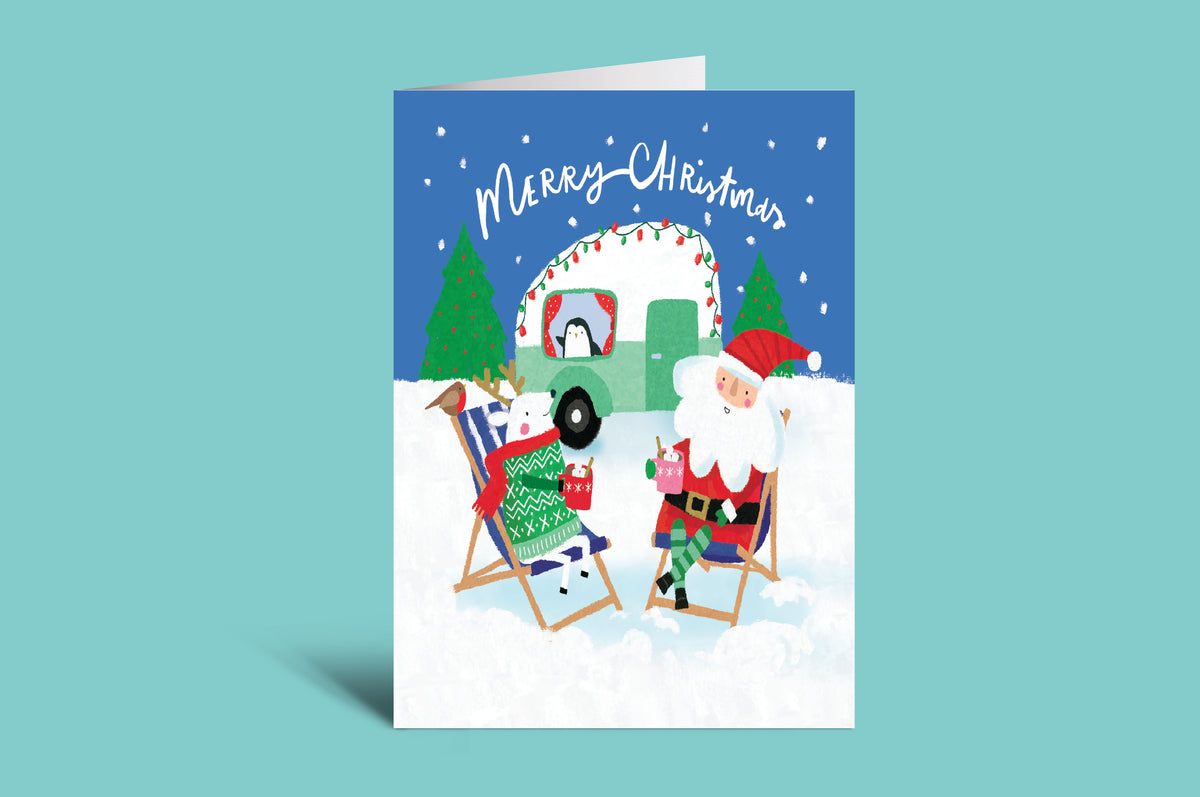 Christmas card with Santa Claus and reindeer on a blue background