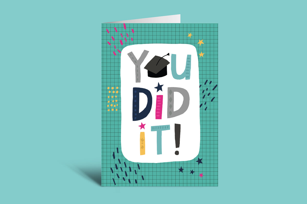 Graduation-themed card with 'You Did It!' text on a green background