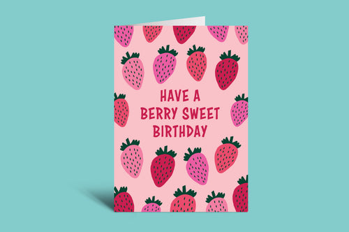 Greeting card with strawberry pattern and 'Have a berry sweet birthday' text on a pink background
