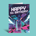 A retro-futuristic 11th birthday greeting card featuring a neon cyberpunk cityscape with flying cars and the text 'HAPPY 11th BIRTHDAY!' in bold white letters, shown standing upright against a solid light teal background.