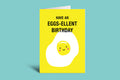 Greeting card with a smiling egg illustration and text on a green background