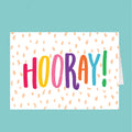 Colorful 'HOORAY!' text on a white background with orange dots, against a teal border.