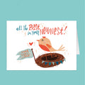 Card with a bird in a nest and text 'all the best in your new nest' on a teal background
