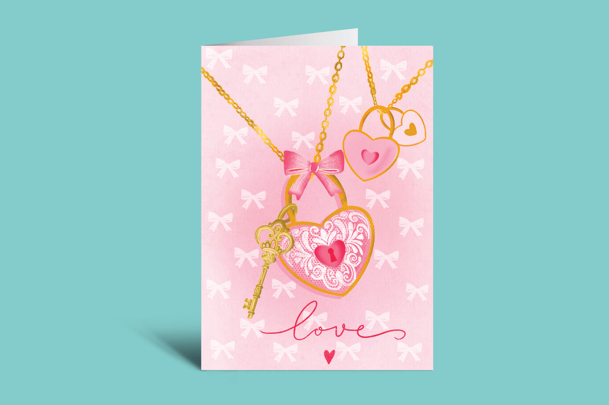 Card with heart-shaped key and bow necklace illustration on a pink background with 'love' text.