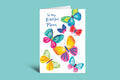 Greeting card with colorful butterflies and 'To my Beautiful Mum' text on a teal background