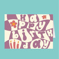 Birthday card with colorful text and graphics on a teal background