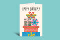 Birthday card with colorful gift boxes and 'Happy Birthday' text on a light blue background