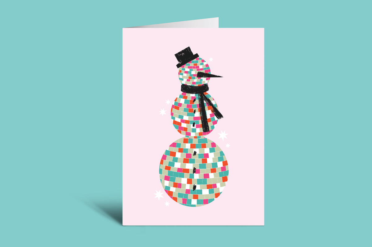 Greeting card with a colorful snowman design on a pink background
