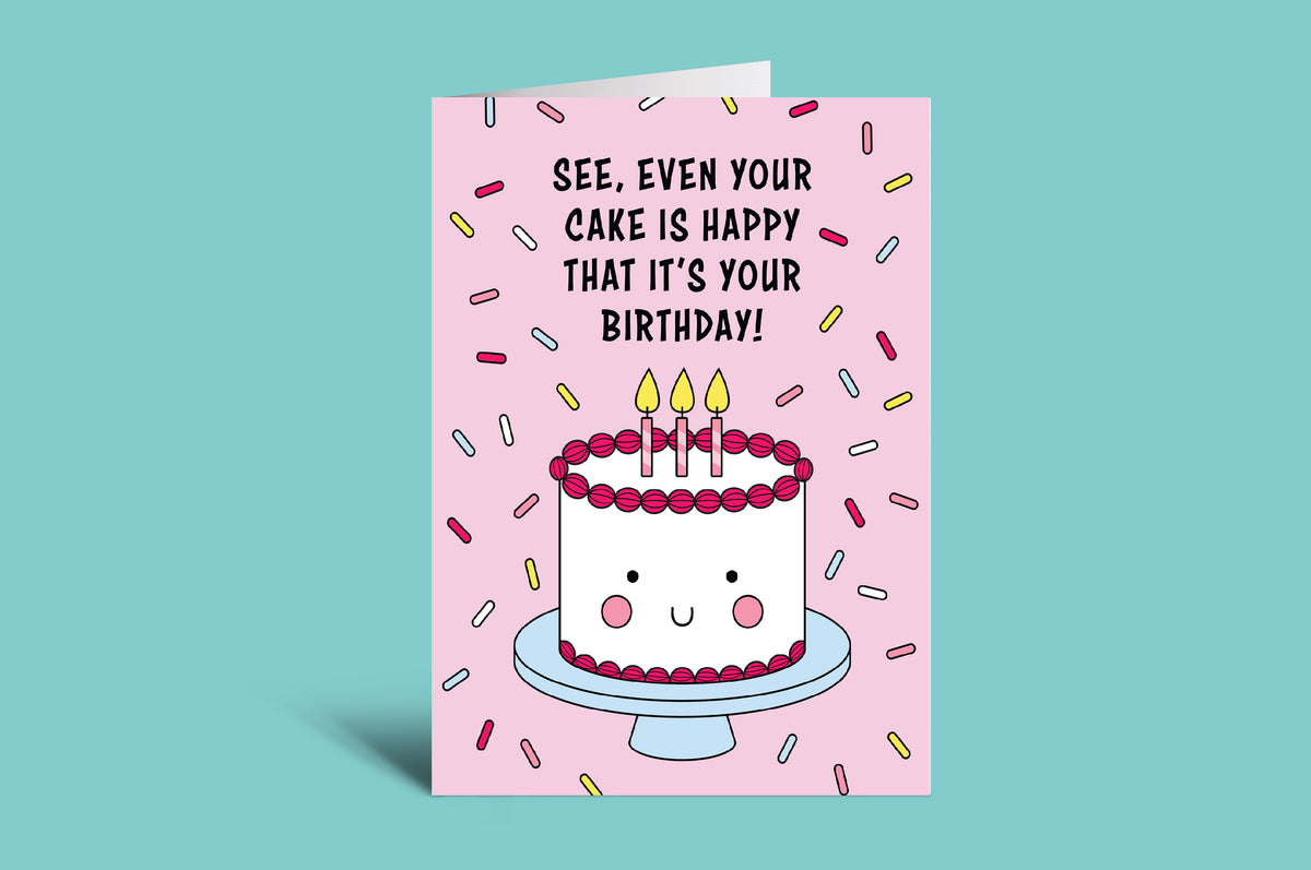 Birthday card with a cake illustration and humorous text on a pink background