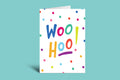 Colorful greeting card with 'WOO HOO!' text on a green background